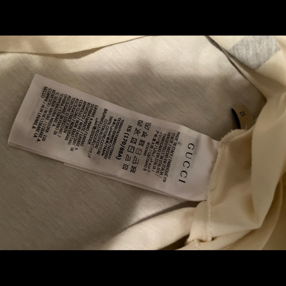 Men’s Gucci shirt only worn once I have taken to the cleaners to get clean.